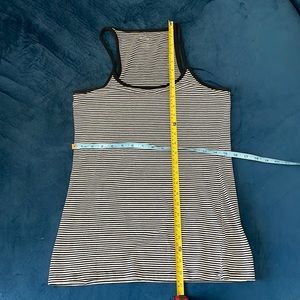 Large tank top. Worn once or twice. No dogs no smoking. Open to all offers!